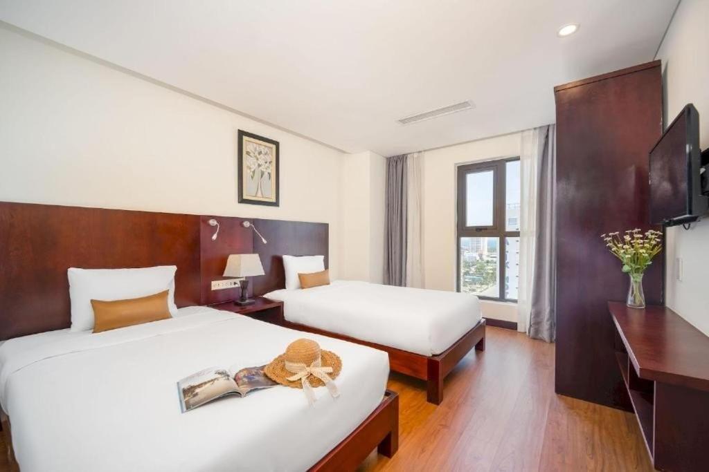 เกมมา โฮเต็ล แอนด์ อพาร์ตเมนต์ Hotel ดานัง ห้อง รูปภาพ